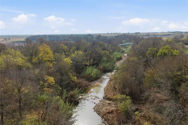 a view of a lake with mountains in the background
