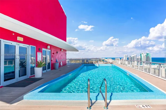 a view of a street with sitting area