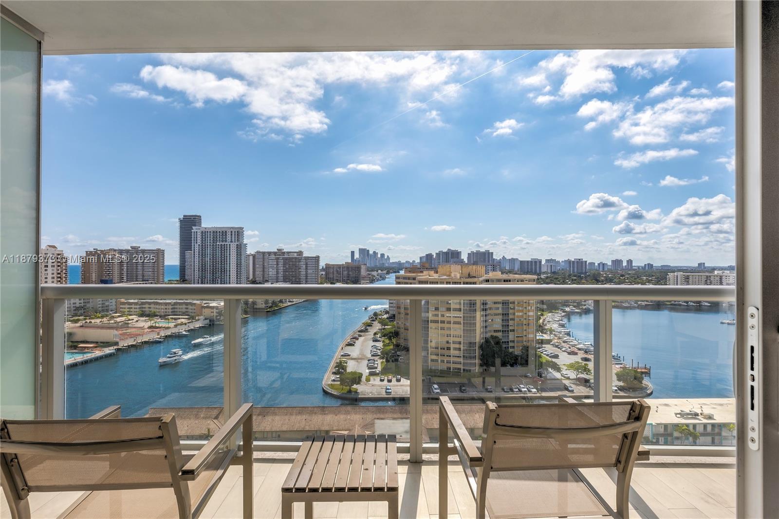 2602 East Hallandale Beach Boulevard, Unit R2109 Hallandale Beach, FL 33009 - Photo 25 of 47 a view of a terrace with furniture and stove