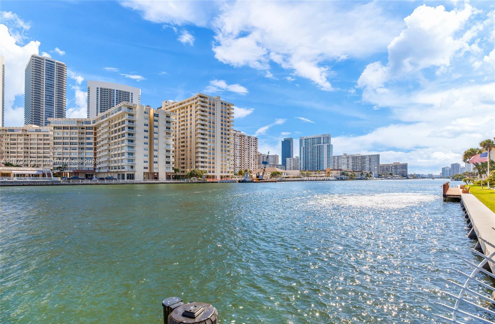 2602 East Hallandale Beach Boulevard, Unit R2109 Hallandale Beach, FL 33009 - Photo 44 of 47 a view of a patio with chair and table