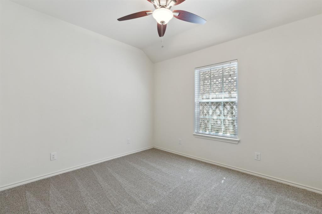 233 Firefly Drive Springtown, TX 76082 - Photo 15 of 16 Bedroom featuring ceiling fan and miniblinds.