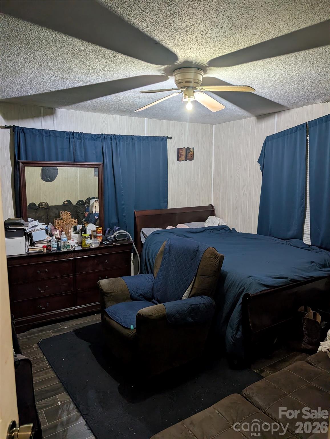 2225 Old McKinney Road York, SC 29745 - Photo 4 of 12 a living room with furniture a chandelier and a flat screen tv