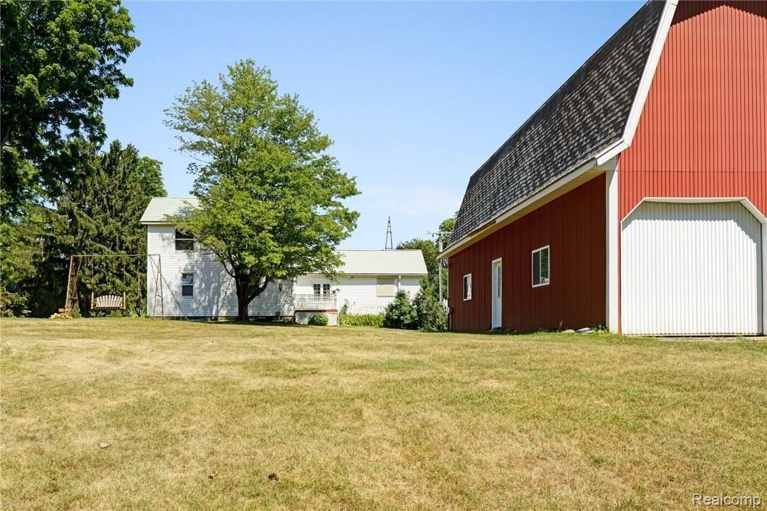9675 Roberts Road Gregory, MI 48137 - Photo 8 of 33 Large pole barn also features rear entrance.