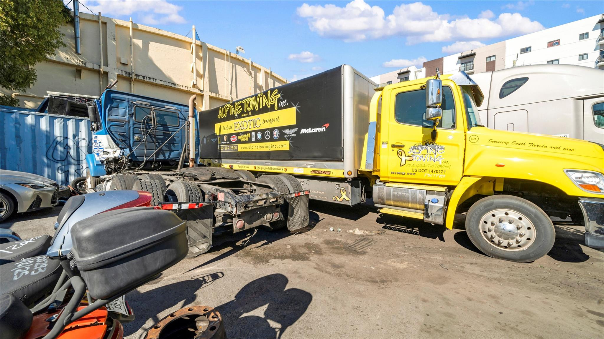 820 Northwest 23rd Street Miami, FL 33127 - Photo 17 of 64 a view of a garage with parked cars