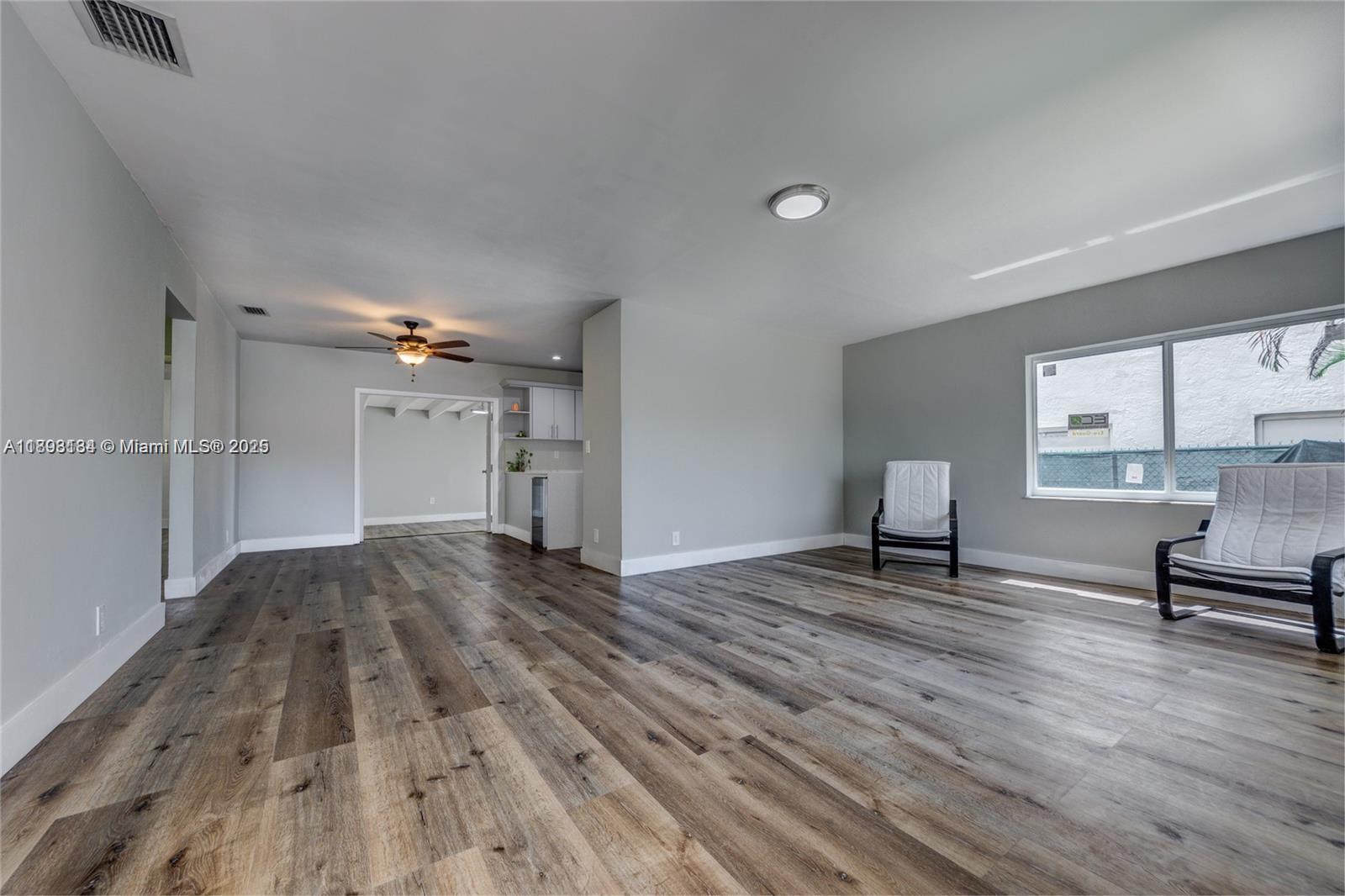 2363 Southwest 21st Terrace Miami, FL 33145 - Photo 6 of 19 a view of a livingroom with a hardwood and a sink