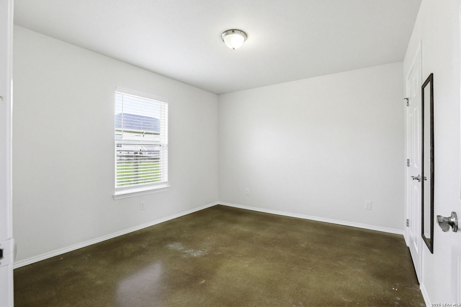 752 Cimarron, Unit B Spring Branch, TX 78070 - Photo 13 of 23 an empty room with a window