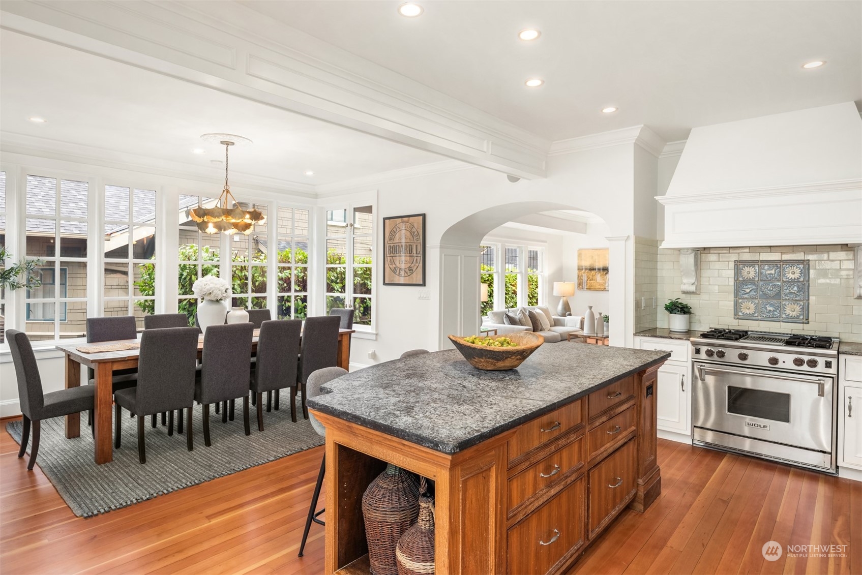 3206 East Terrace Street Seattle, WA 98122 - Photo 12 of 28 a view of a dining room with furniture window and wooden floor