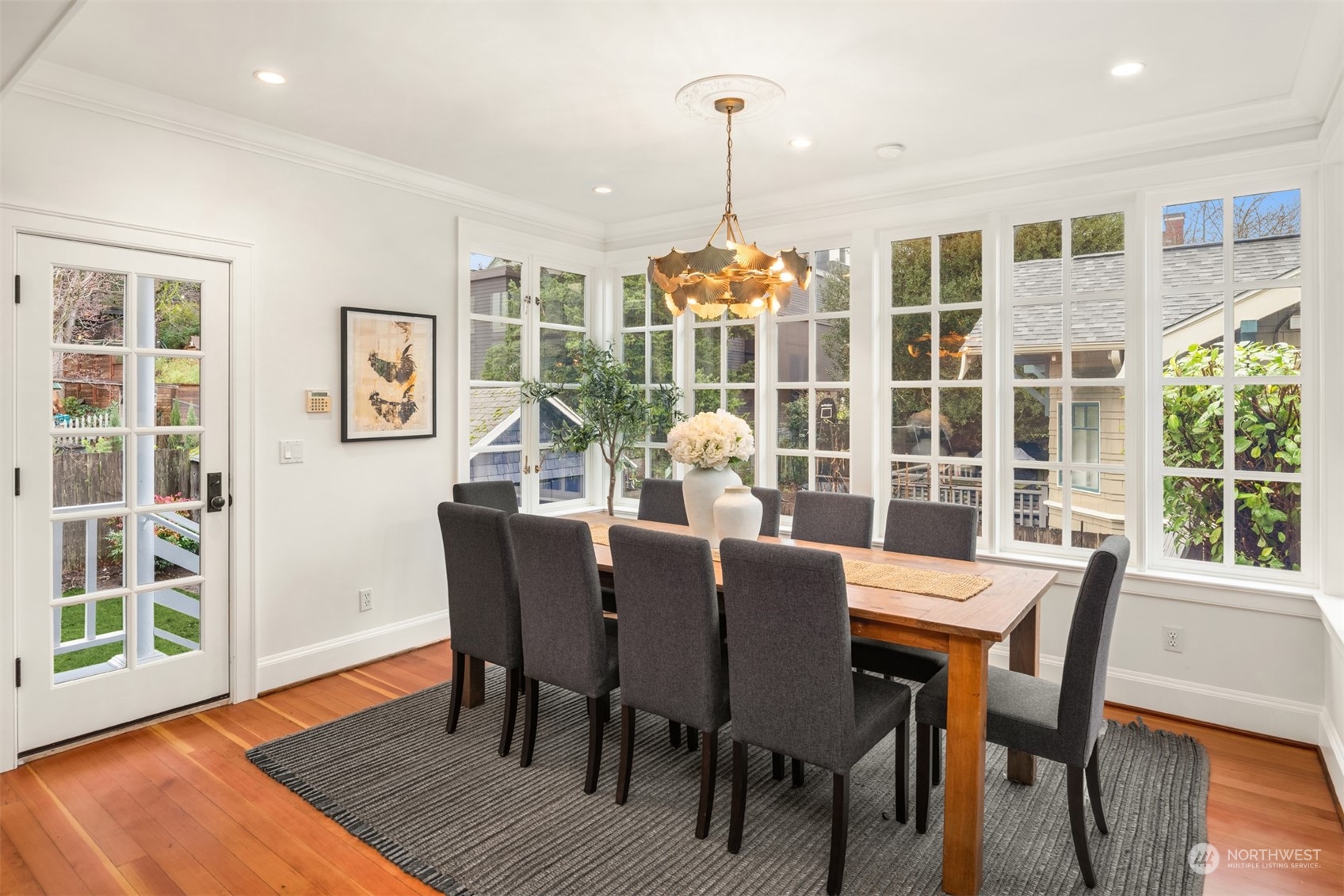 3206 East Terrace Street Seattle, WA 98122 - Photo 13 of 28 a view of a dining room with furniture window and wooden floor