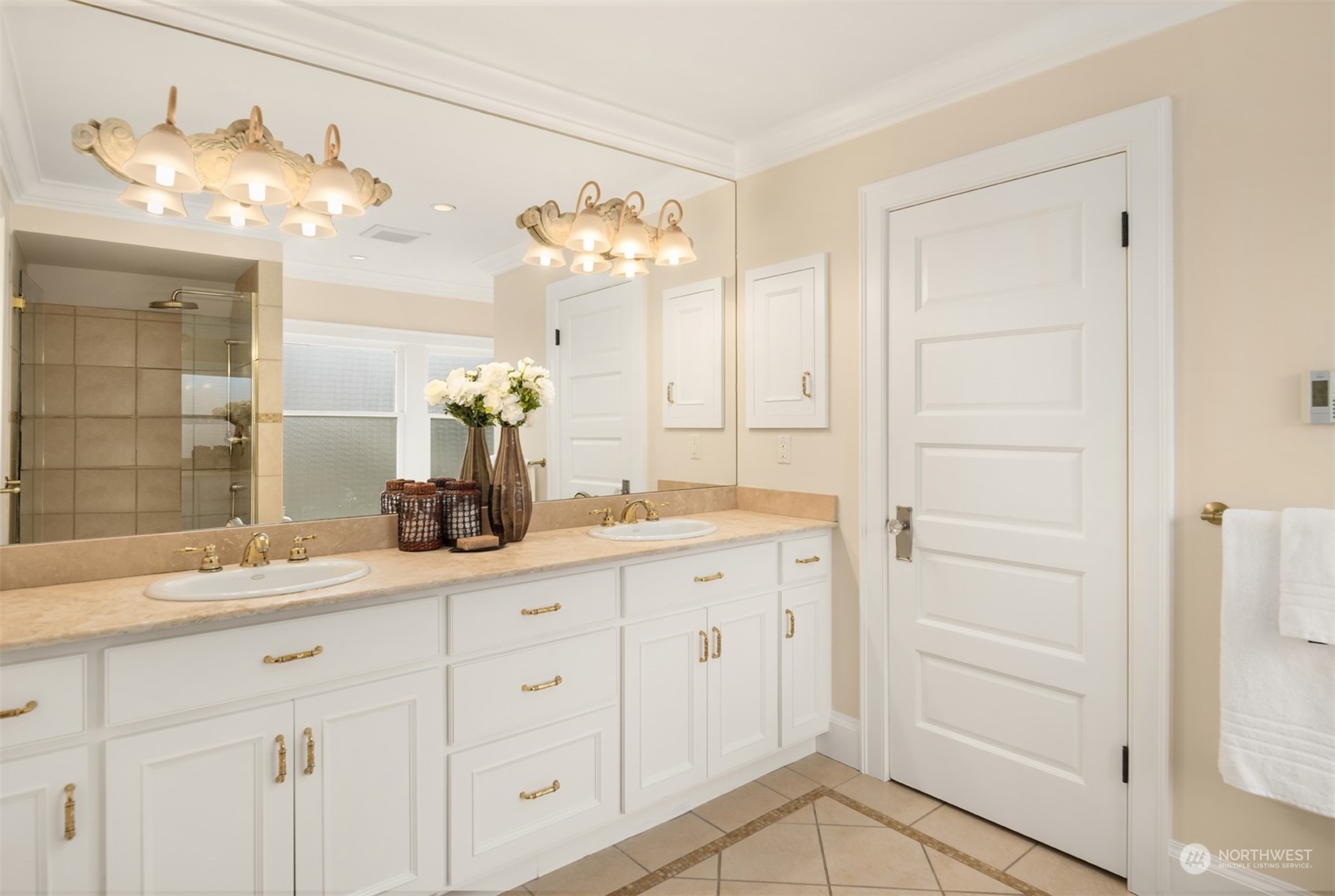 3206 East Terrace Street Seattle, WA 98122 - Photo 18 of 28 a bathroom with a double vanity sink and a mirror