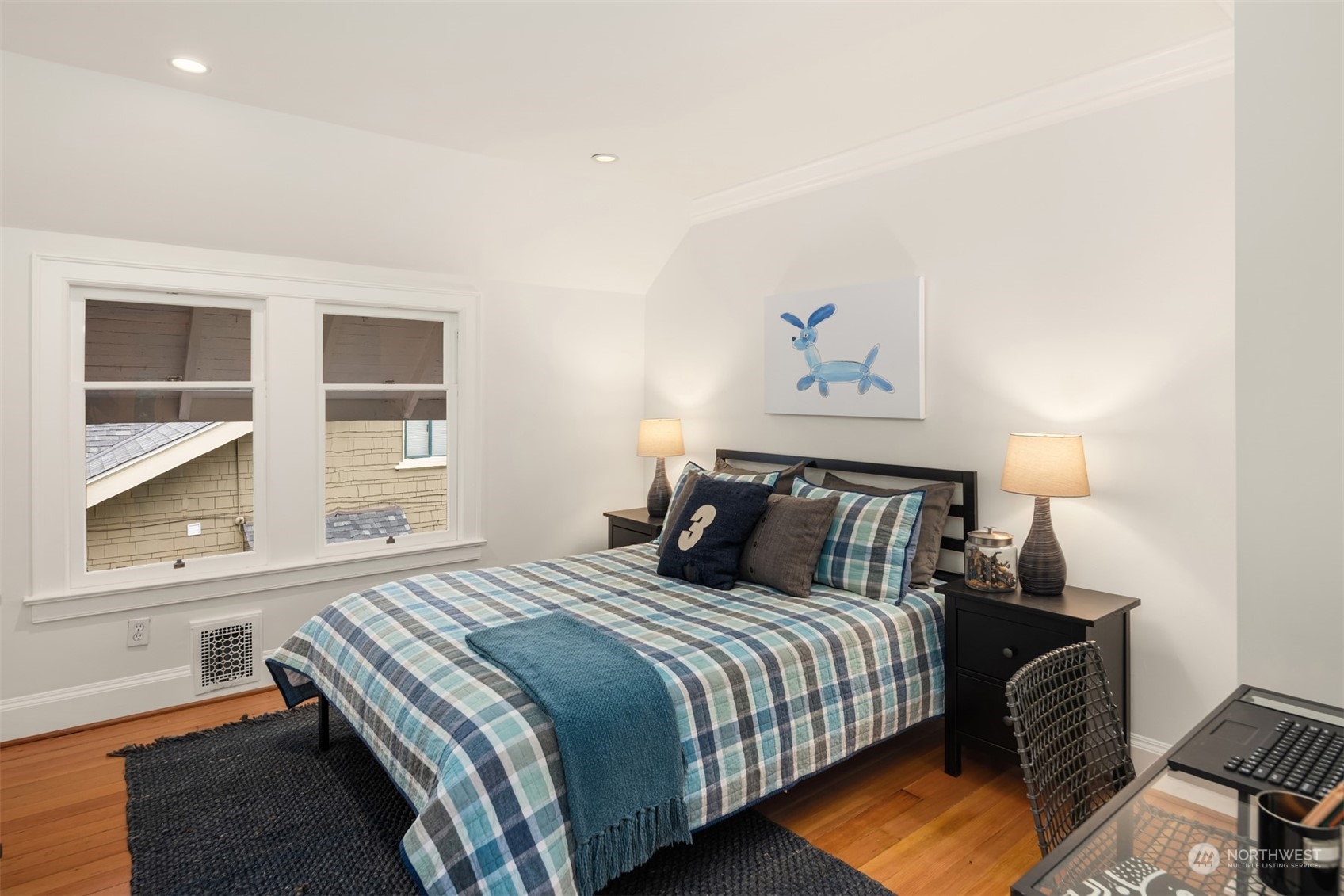 3206 East Terrace Street Seattle, WA 98122 - Photo 20 of 28 a bedroom with a bed and a window