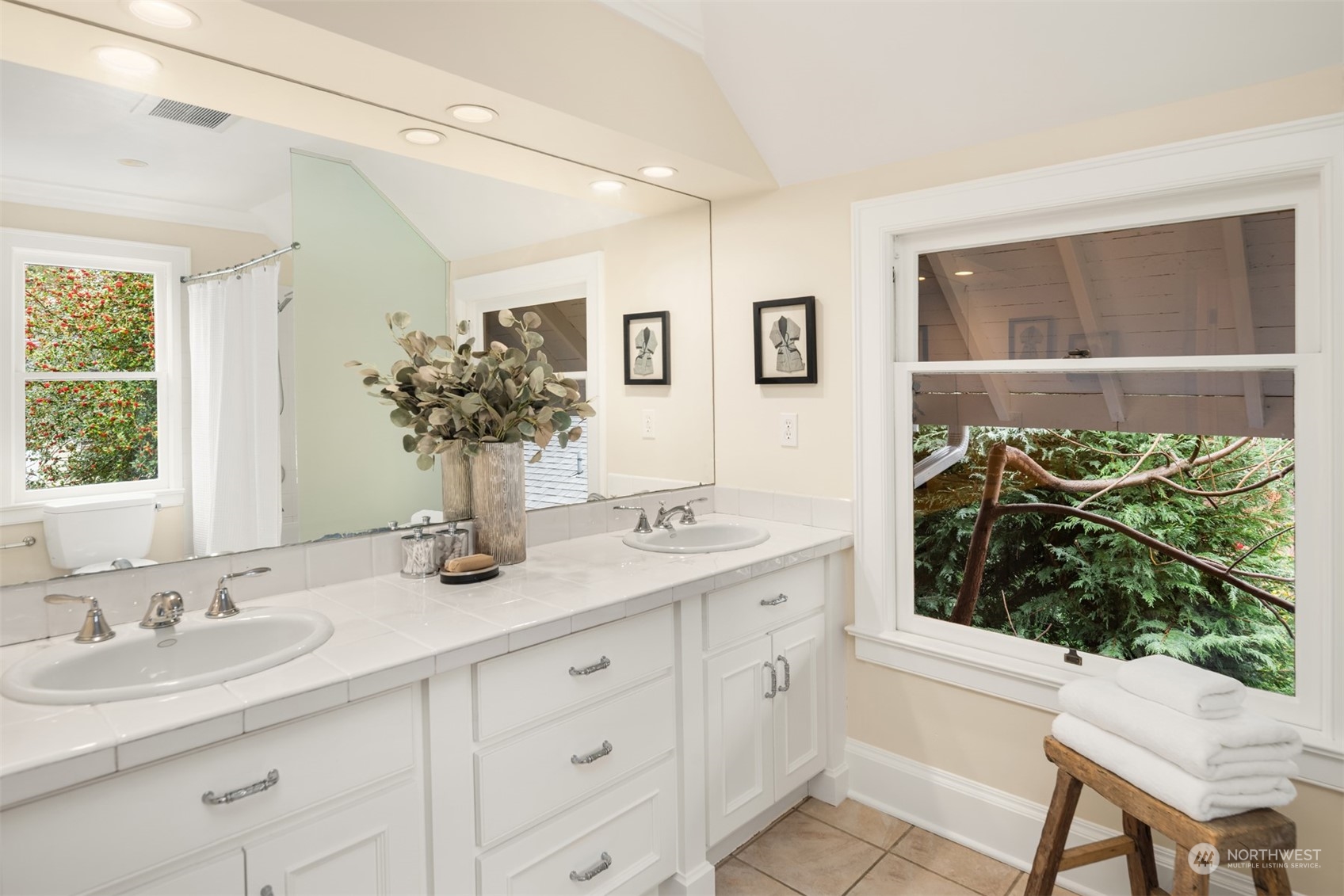 3206 East Terrace Street Seattle, WA 98122 - Photo 22 of 28 a bathroom with a sink and a mirror