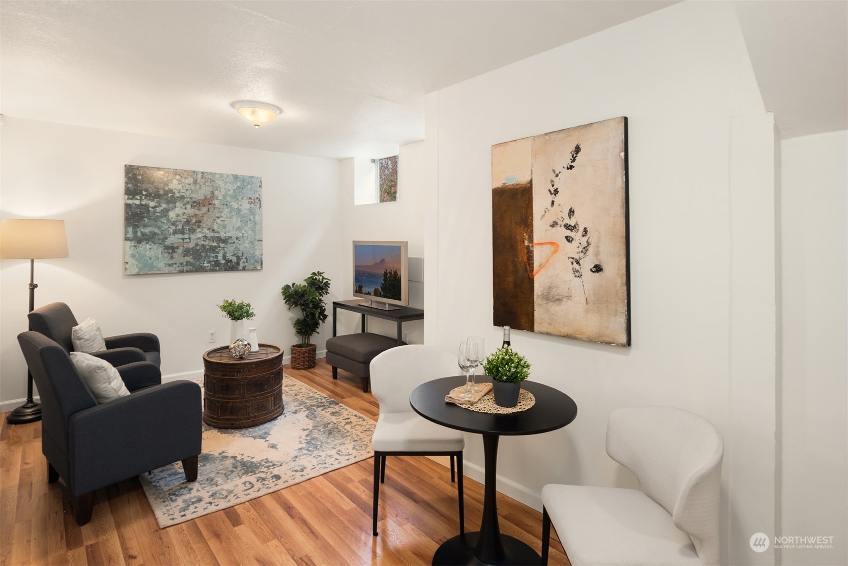 3206 East Terrace Street Seattle, WA 98122 - Photo 23 of 28 a living room with furniture and a table