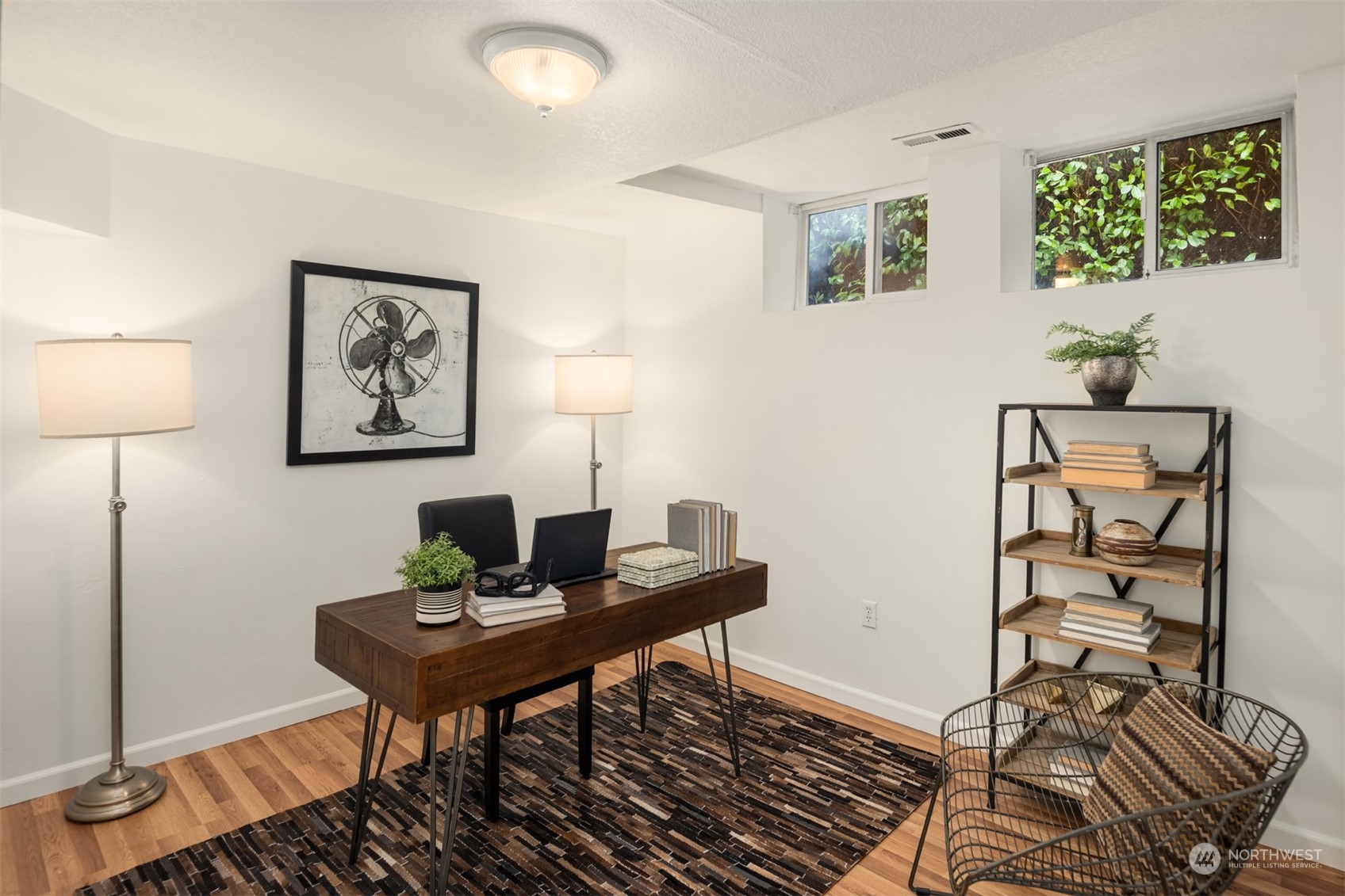 3206 East Terrace Street Seattle, WA 98122 - Photo 25 of 28 a view of a workspace with furniture