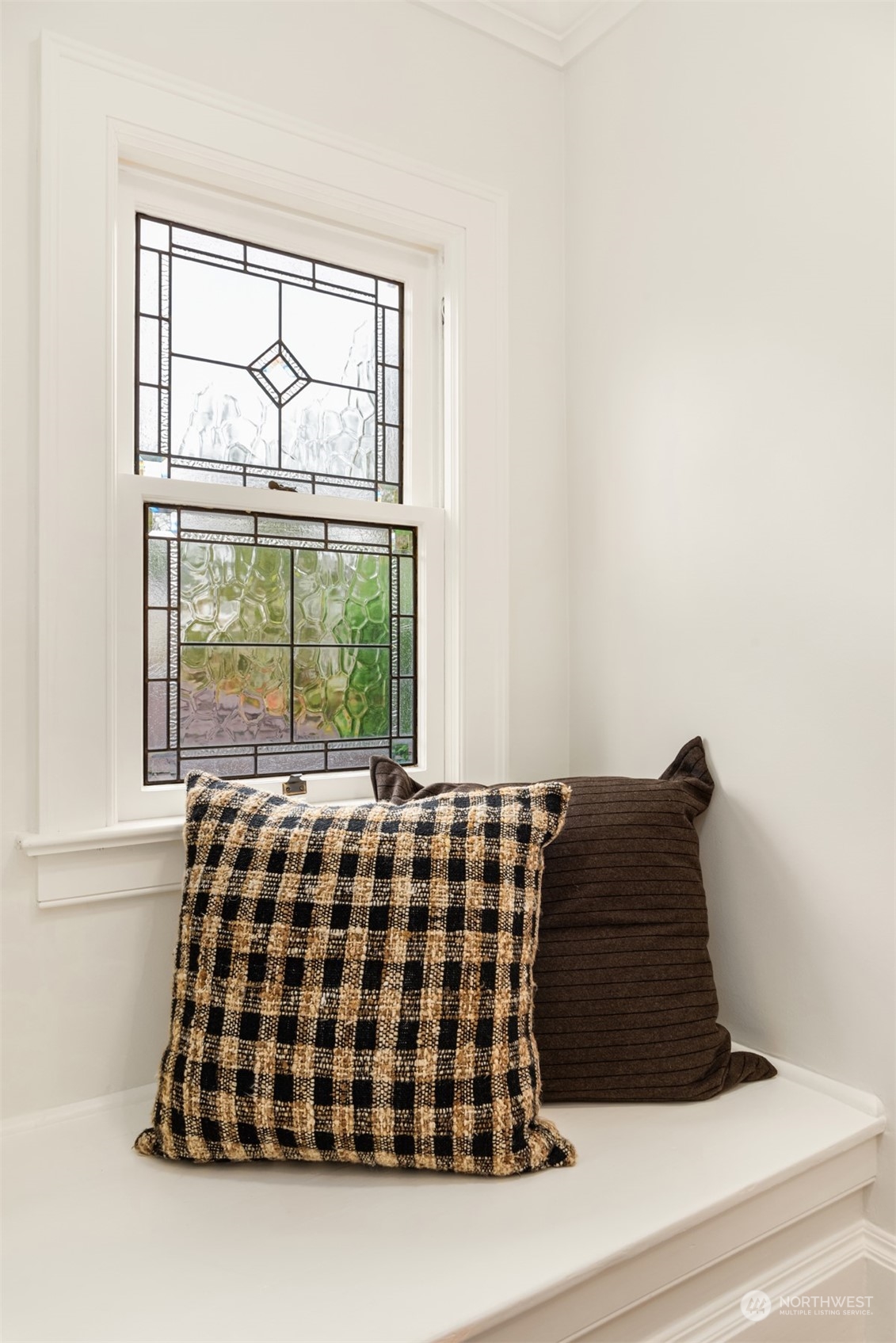 3206 East Terrace Street Seattle, WA 98122 - Photo 28 of 28 a bedroom with a bed and a window