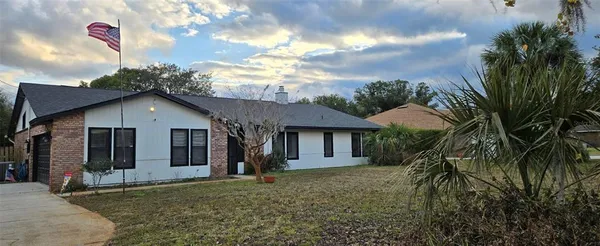 a house view with a garden space