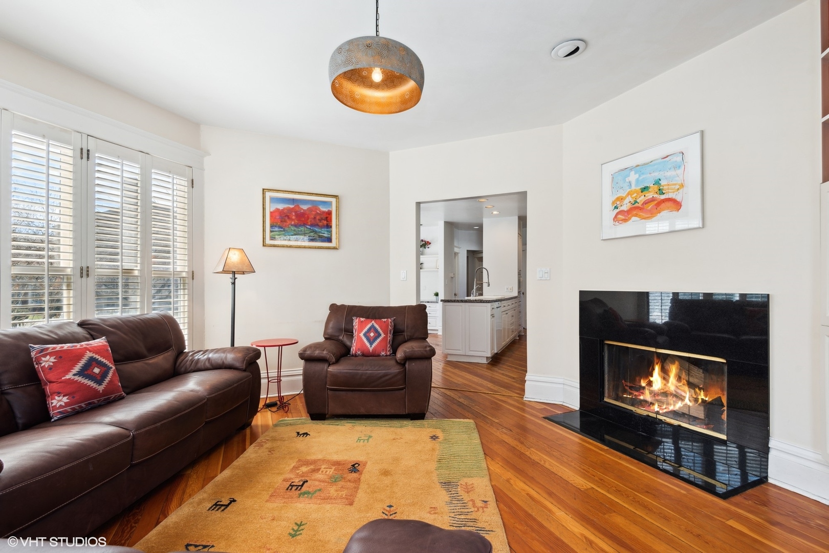 189 Ridge Avenue Winnetka, IL 60093 - Photo 12 of 29 a living room with furniture and a fireplace