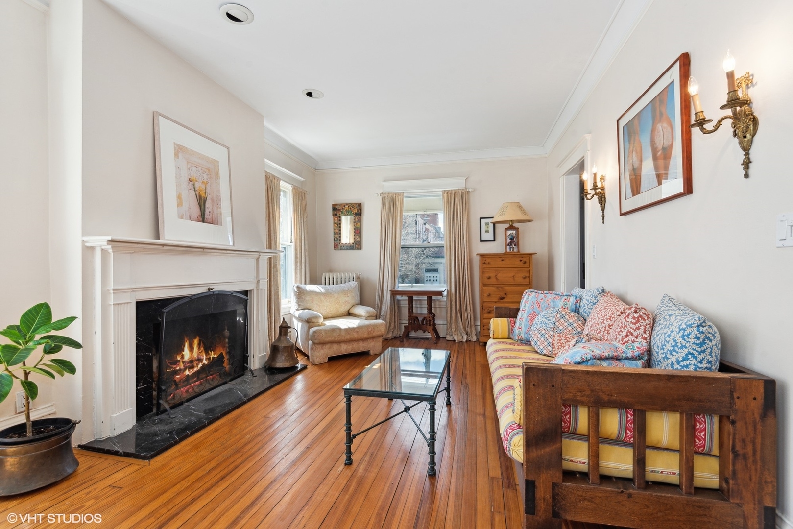 189 Ridge Avenue Winnetka, IL 60093 - Photo 4 of 29 a living room with furniture and a fireplace
