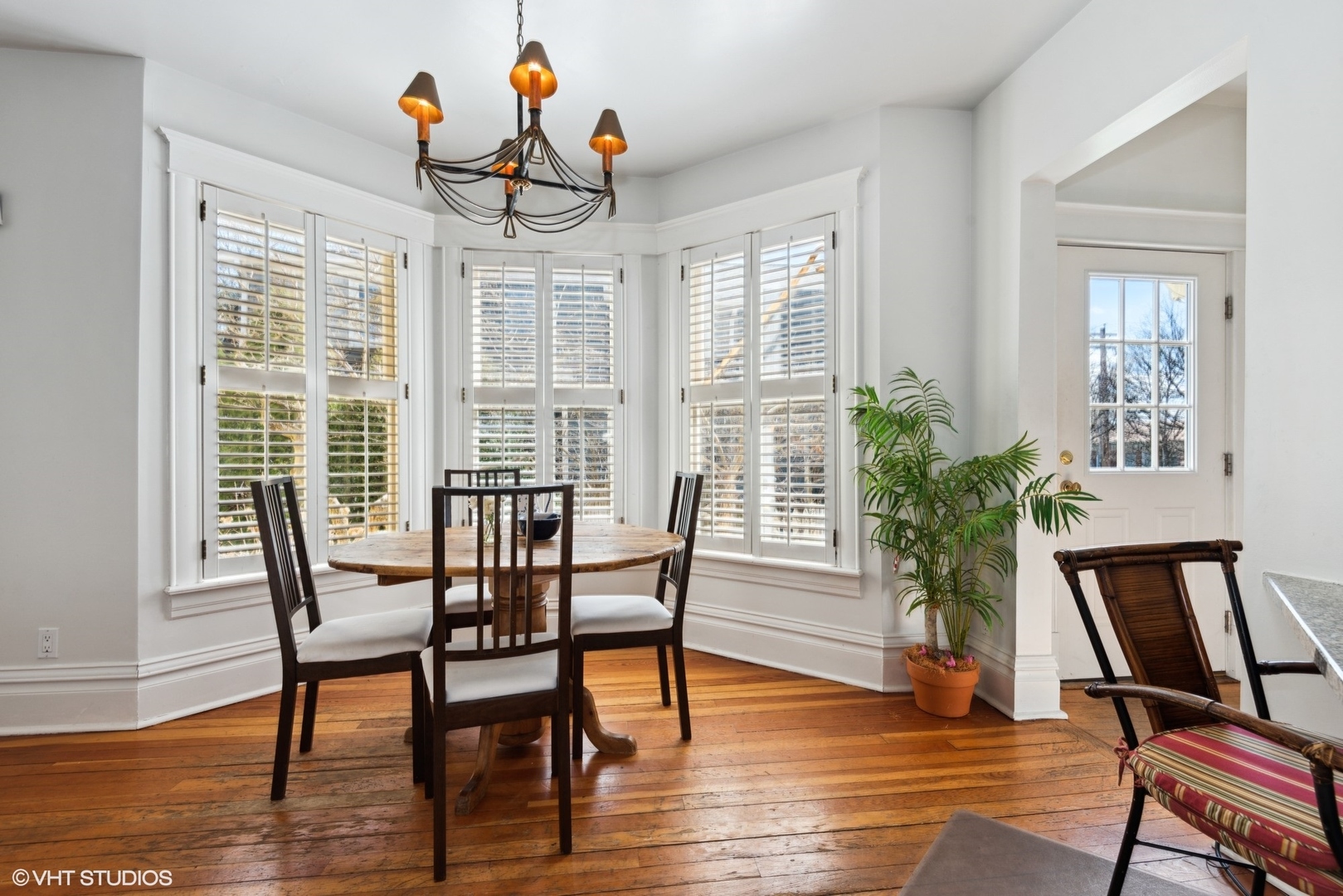 189 Ridge Avenue Winnetka, IL 60093 - Photo 10 of 29 a view of a dining room with furniture window and wooden floor