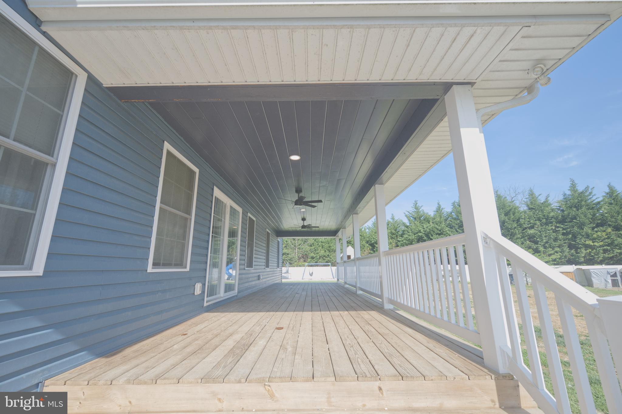 3510 West Denneys Road Dover, DE 19904 - Photo 14 of 41 38' x 10' Back Porch