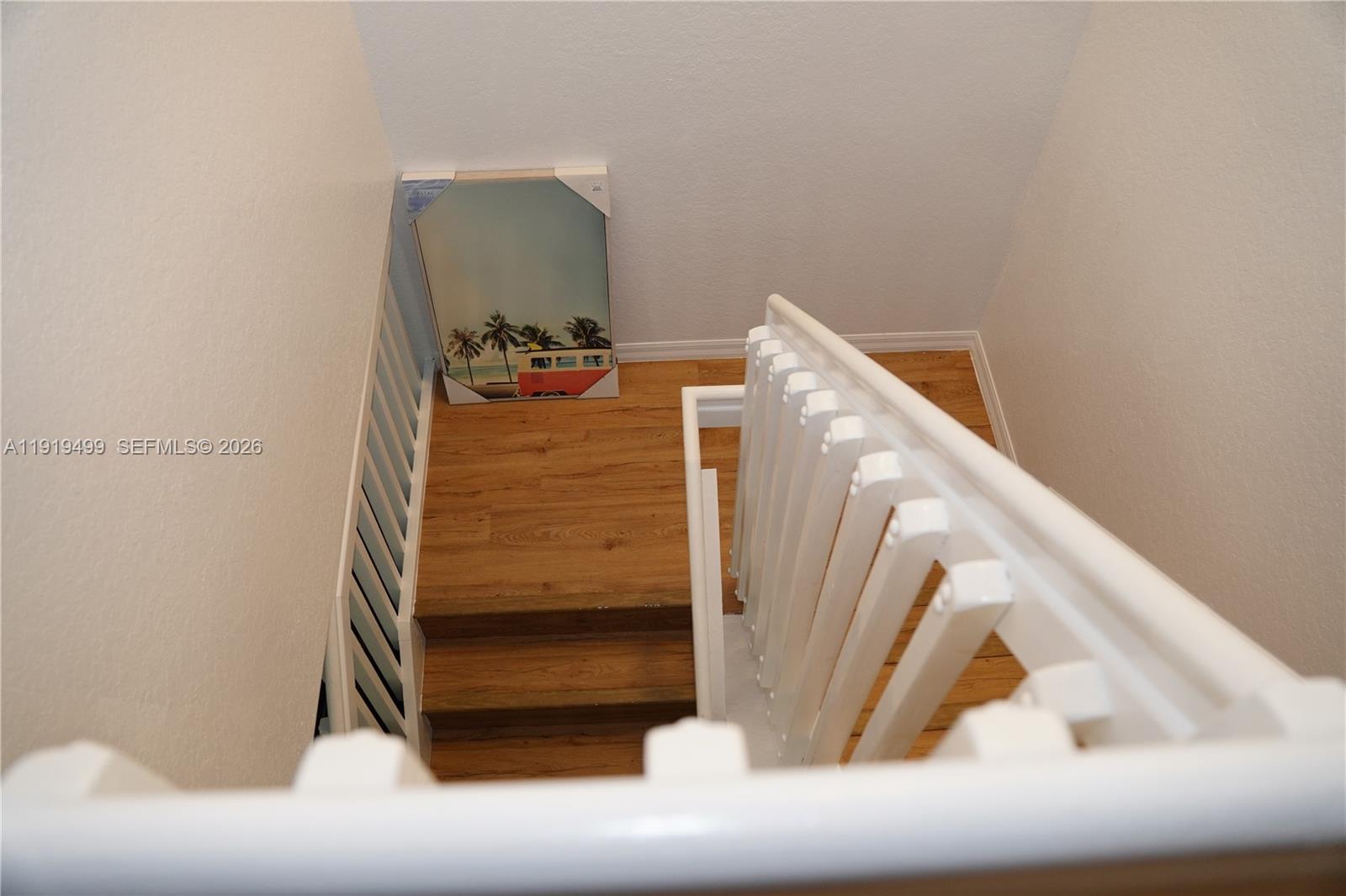 159 Hidden Ct Road Hollywood, FL 33023 - Photo 13 of 29 a view of staircase with white walls