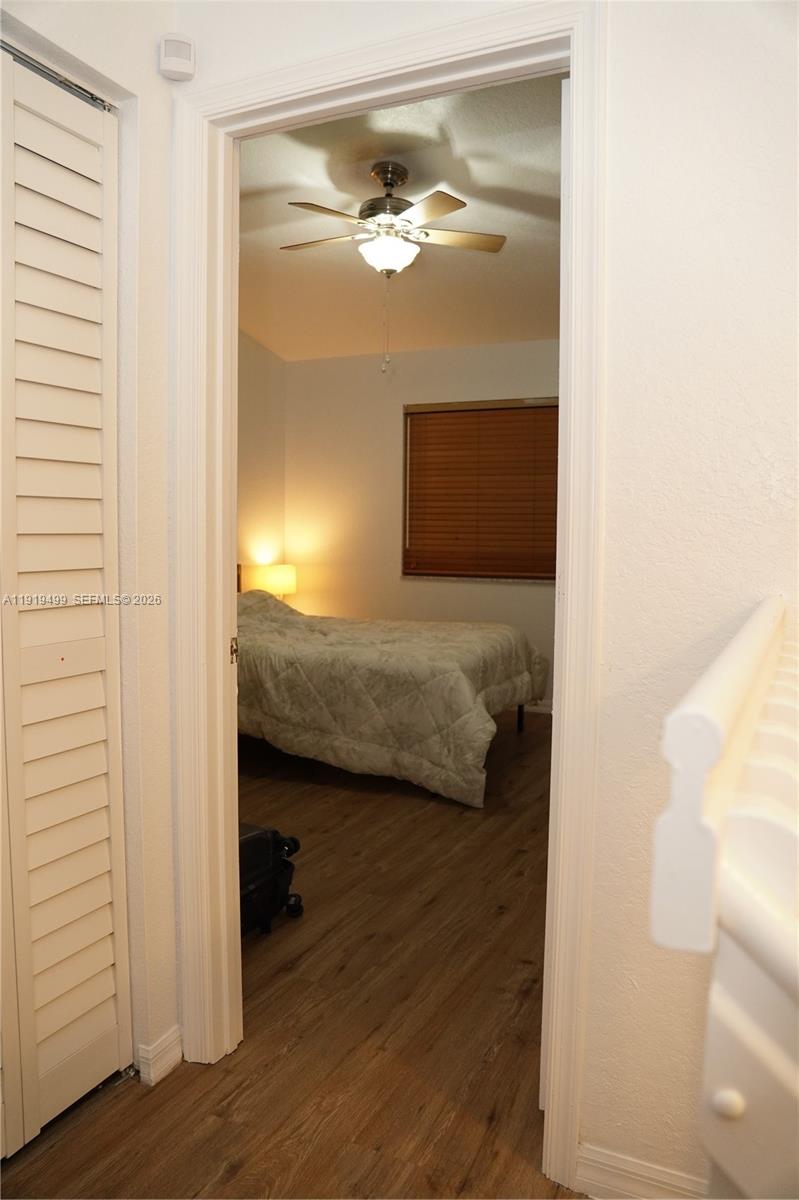 159 Hidden Ct Road Hollywood, FL 33023 - Photo 17 of 29 a en suite bathroom with a sink and a mirror