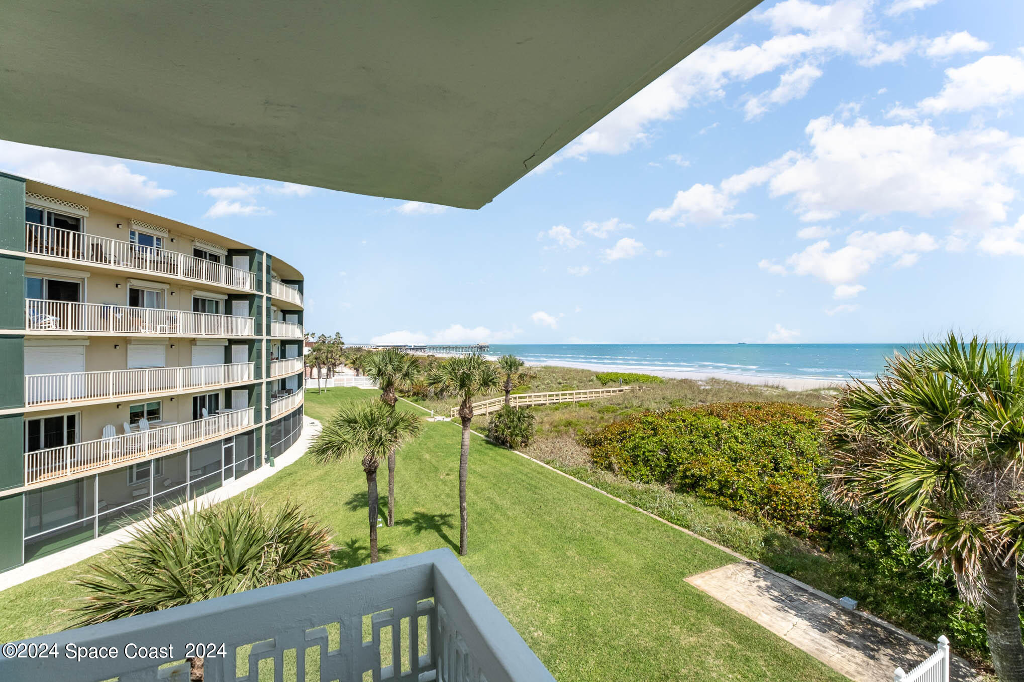 4800 Ocean Beach Boulevard, Unit 311 Cocoa Beach, FL 32931 - Photo 19 of 22 a view of an ocean from a balcony