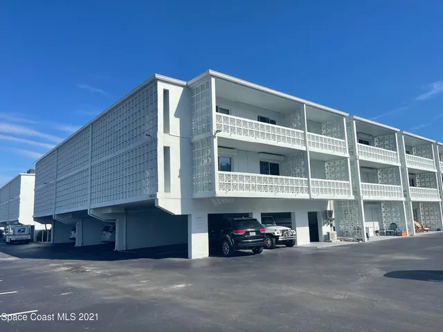 a front view of building with large windows