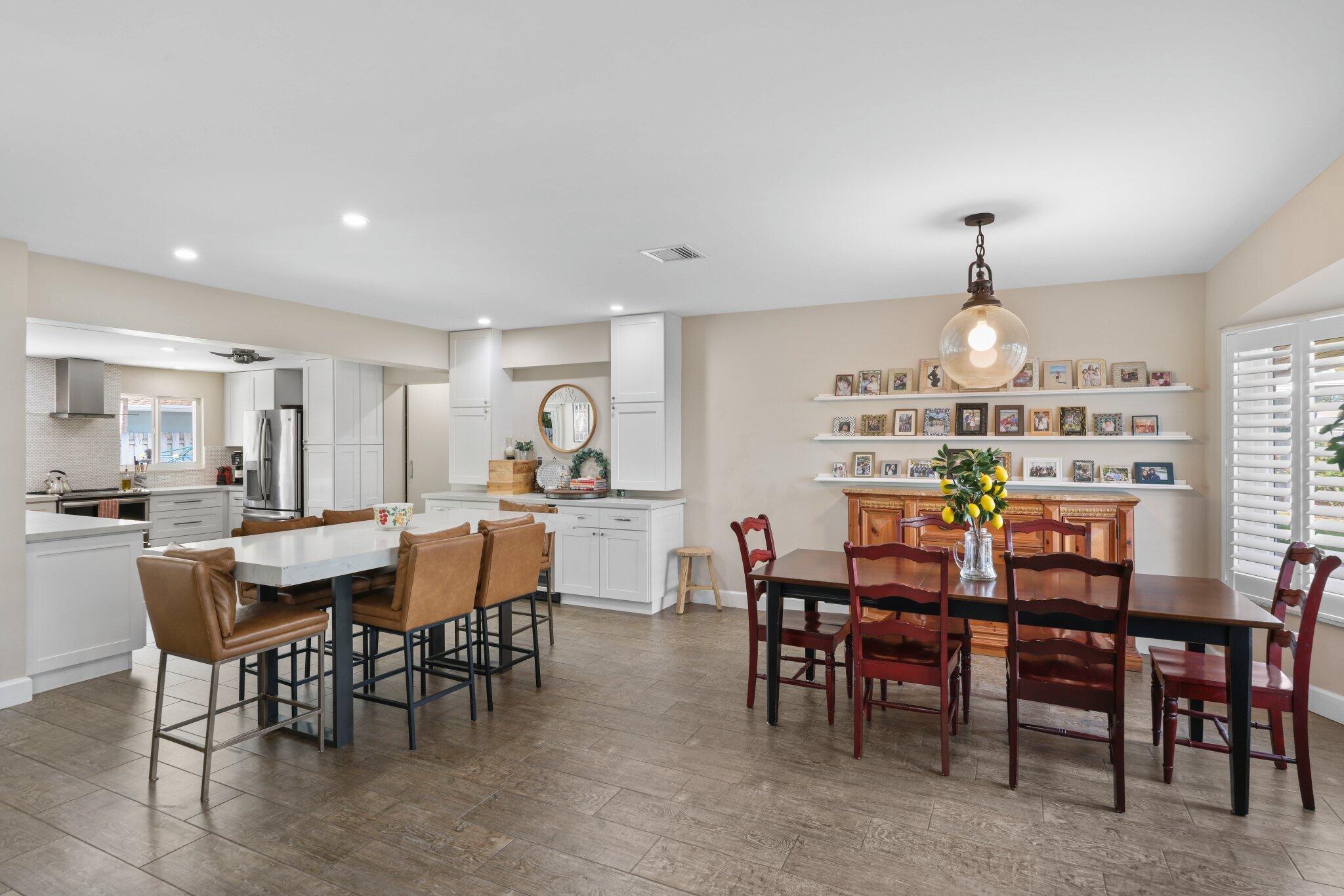 4141 Northeast 22nd Terrace Lighthouse Point, FL 33064 - Photo 12 of 46 a view of a dining room with furniture