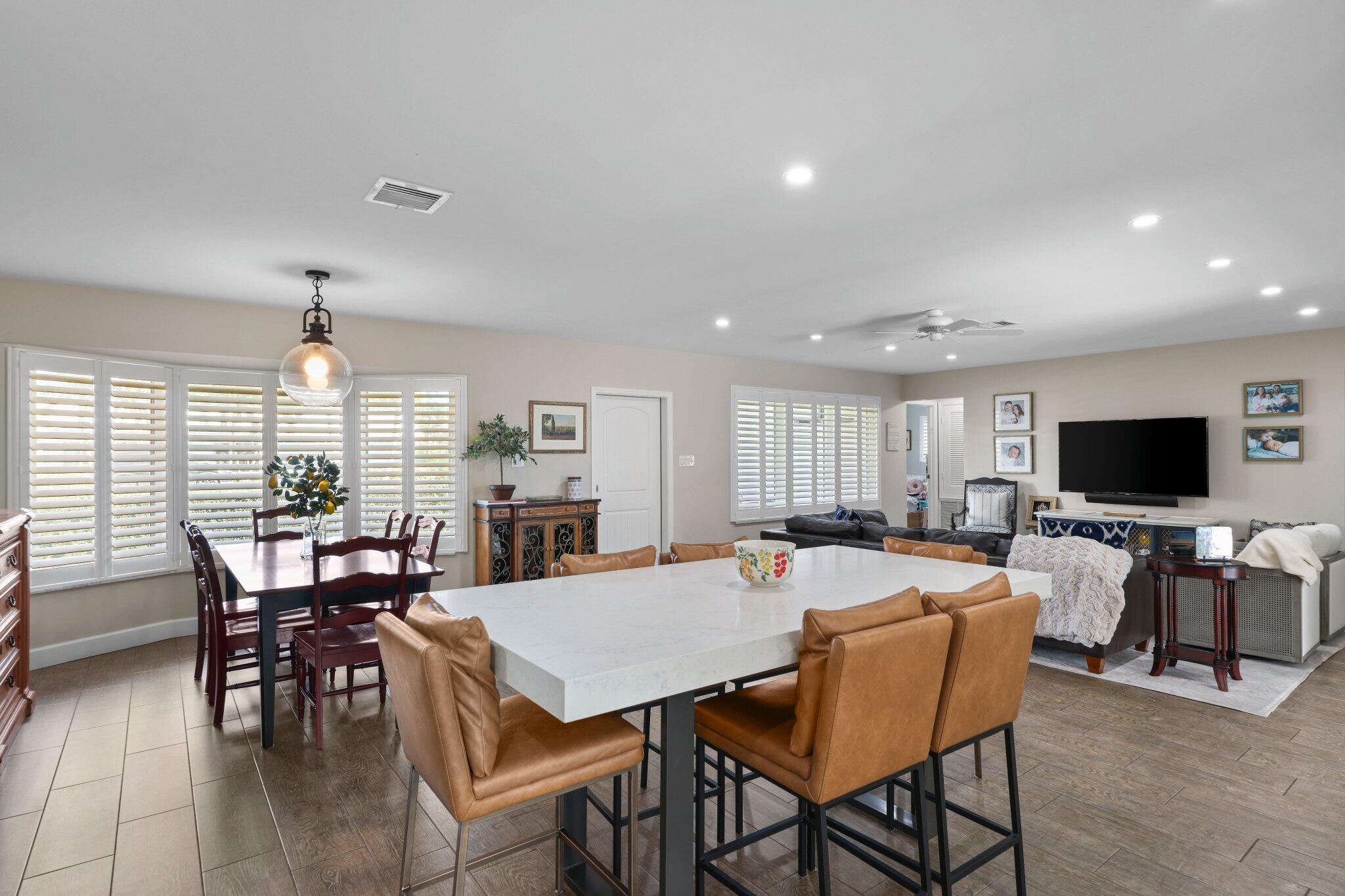 4141 Northeast 22nd Terrace Lighthouse Point, FL 33064 - Photo 17 of 46 a view of a dining room with furniture window and outside view