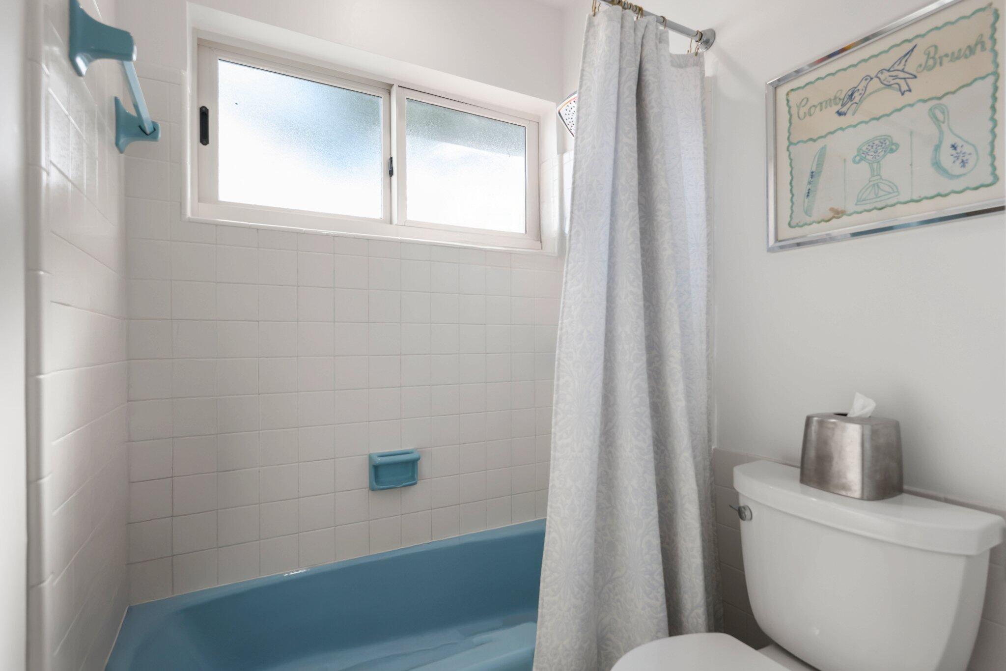 4141 Northeast 22nd Terrace Lighthouse Point, FL 33064 - Photo 26 of 46 a bathroom with a toilet and a sink