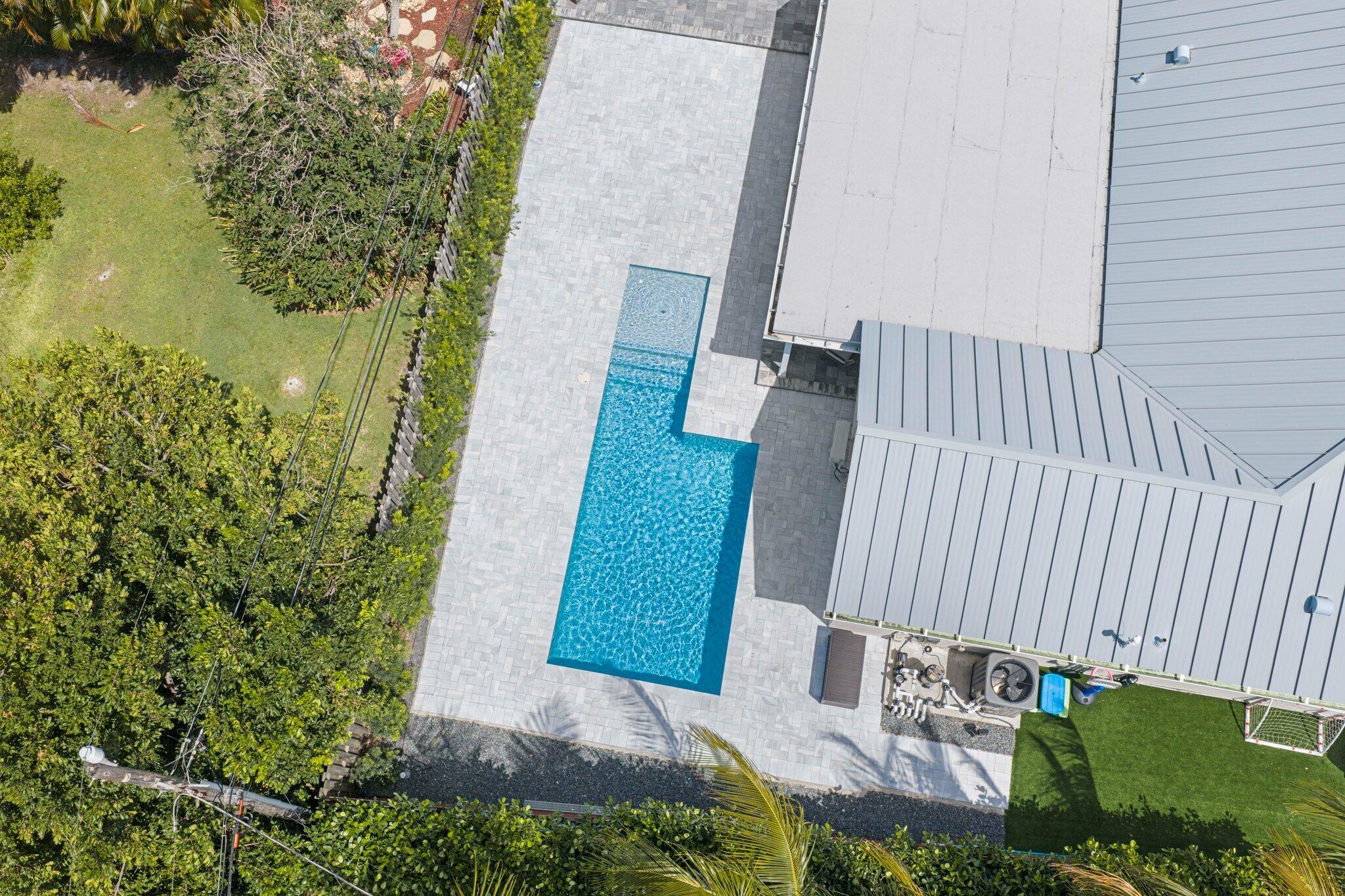 4141 Northeast 22nd Terrace Lighthouse Point, FL 33064 - Photo 43 of 46 an aerial view of a house with a yard