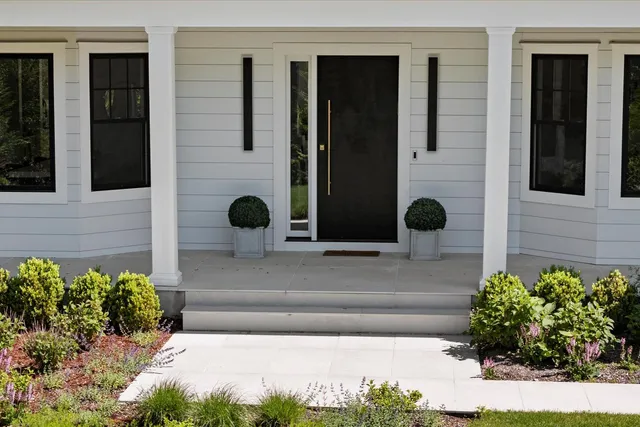 a view of a entryway door front of house