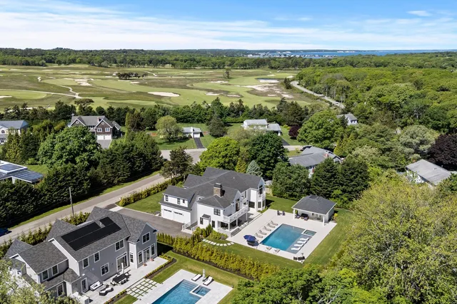 a view of a city with an ocean view