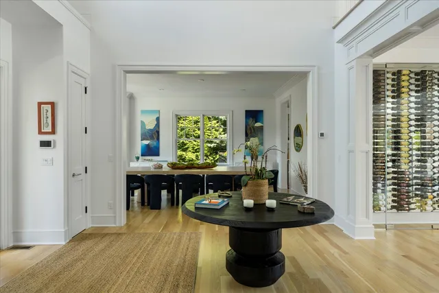a living room with a sink and a window
