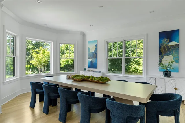 a room with a table and chairs