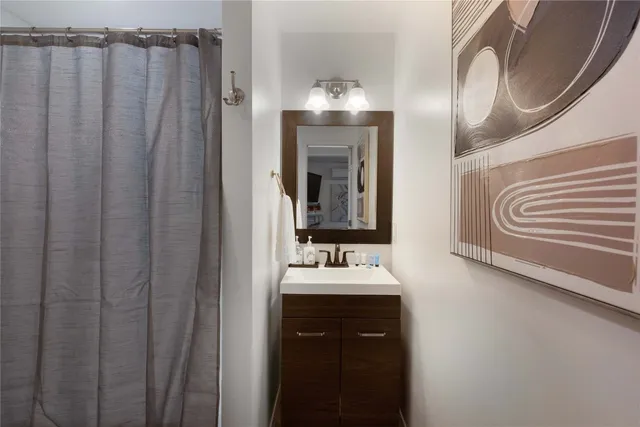 a view of a chairs and table on the deck