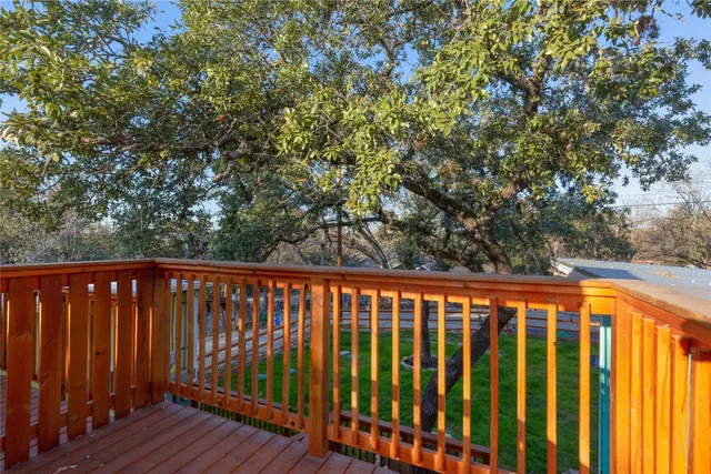 a kitchen with a refrigerator and a sink