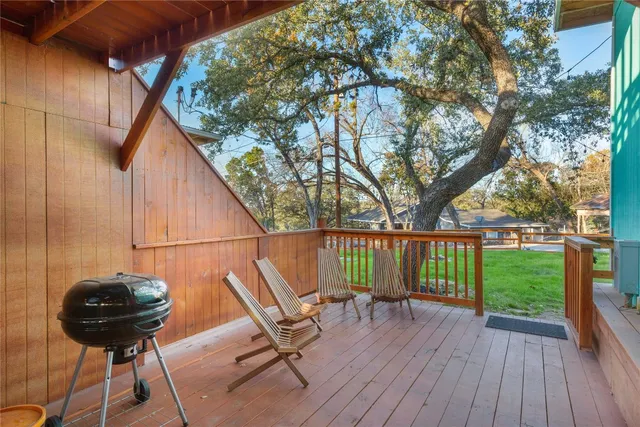 a bedroom with a bed and night stand
