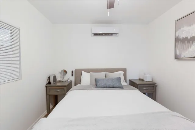 an aerial view of a houses with a yard