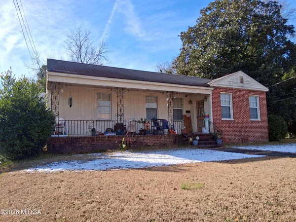a view of a house with a patio