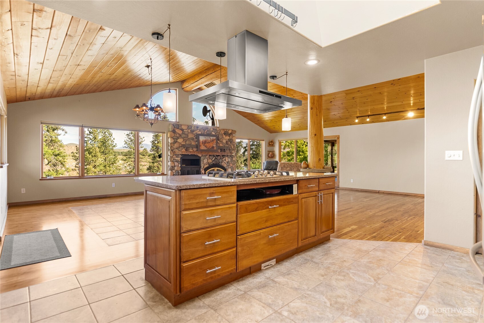 2621 Highway 153 Twisp, WA 98856 - Photo 27 of 40 a kitchen with stainless steel appliances granite countertop a sink and a refrigerator
