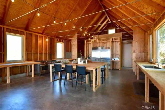 a bedroom with a bed and furniture