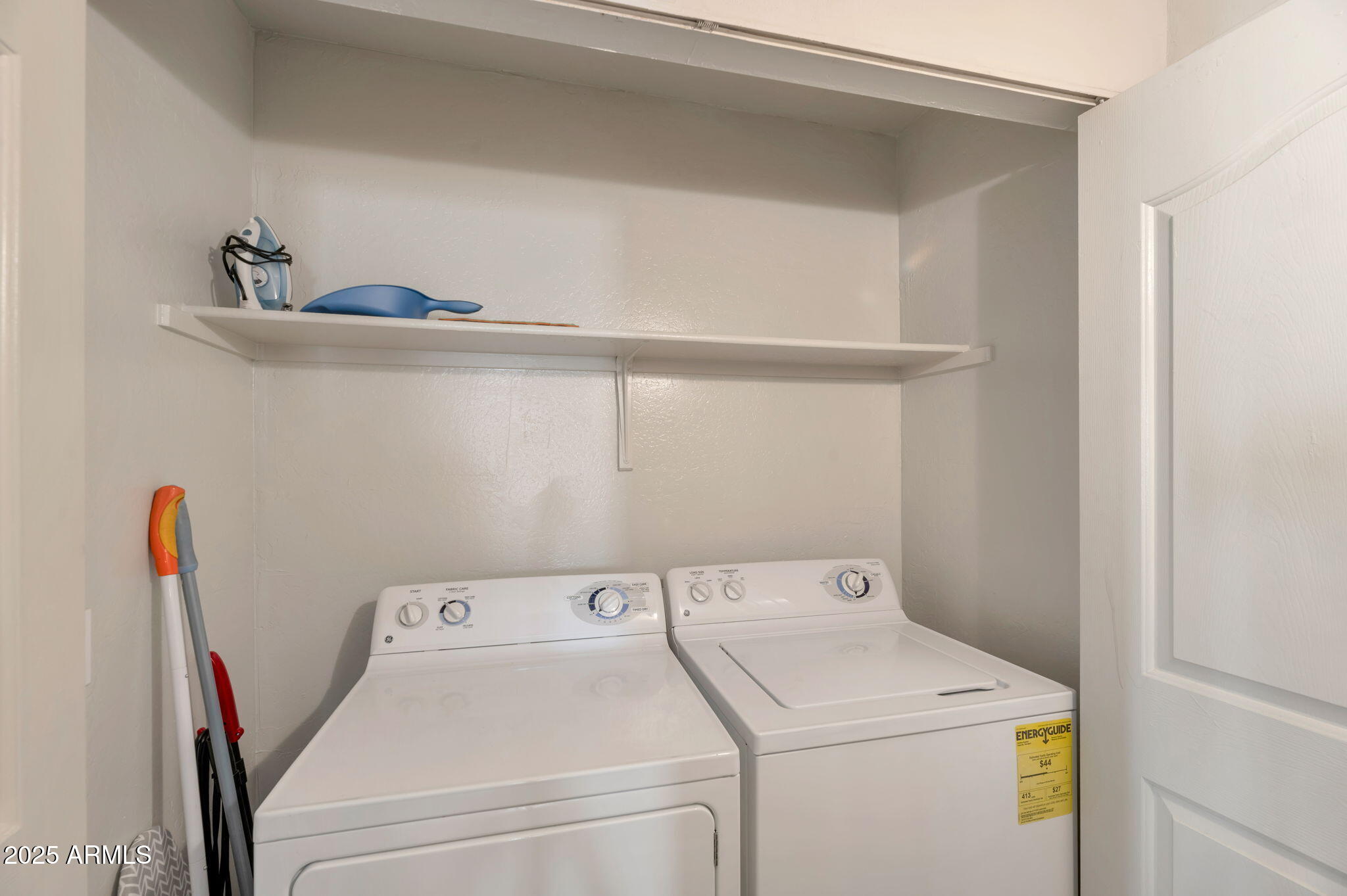 14145 North 92nd Street, Unit 1051 Scottsdale, AZ 85260 - Photo 14 of 21 a utility room with dryer and washer