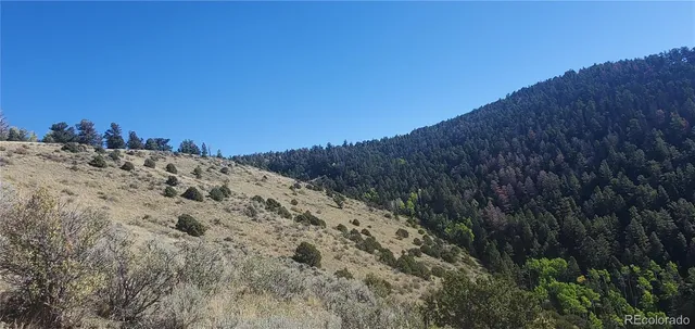 a view of a snow on the top of a mountain