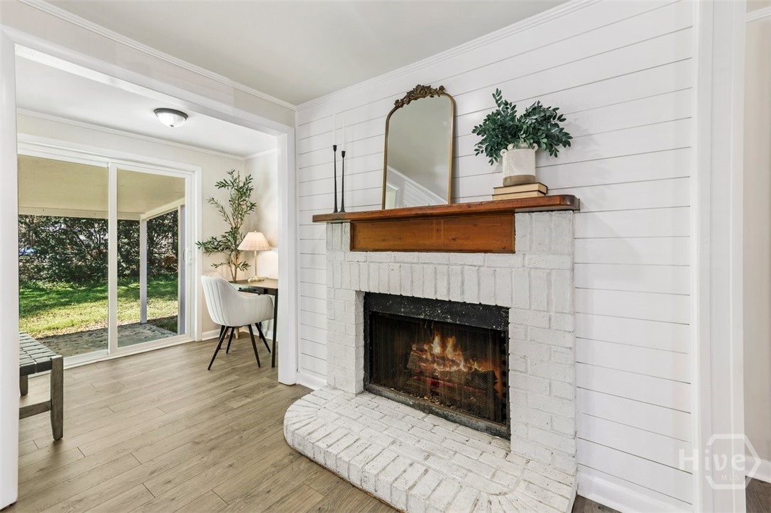 407 Lexington Avenue Rincon, GA 31326 - Photo 11 of 31 Fireplace digitally enhanced. Owners have no knowledge of functionality.