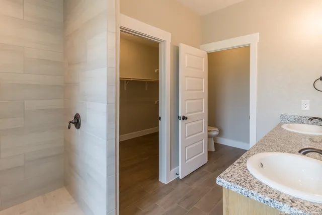 a bathroom with a tub and sink