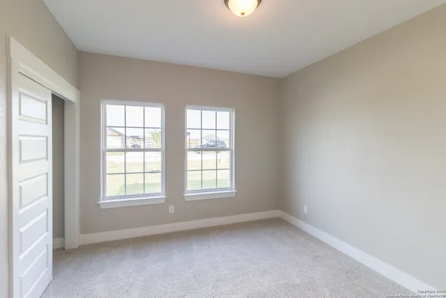 an empty room with windows