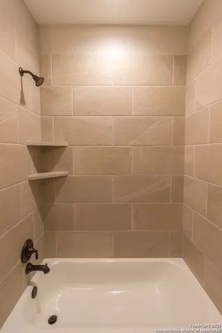 a bathroom with a bathtub