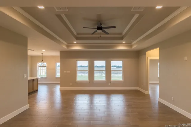 a view of an entryway with wooden floors