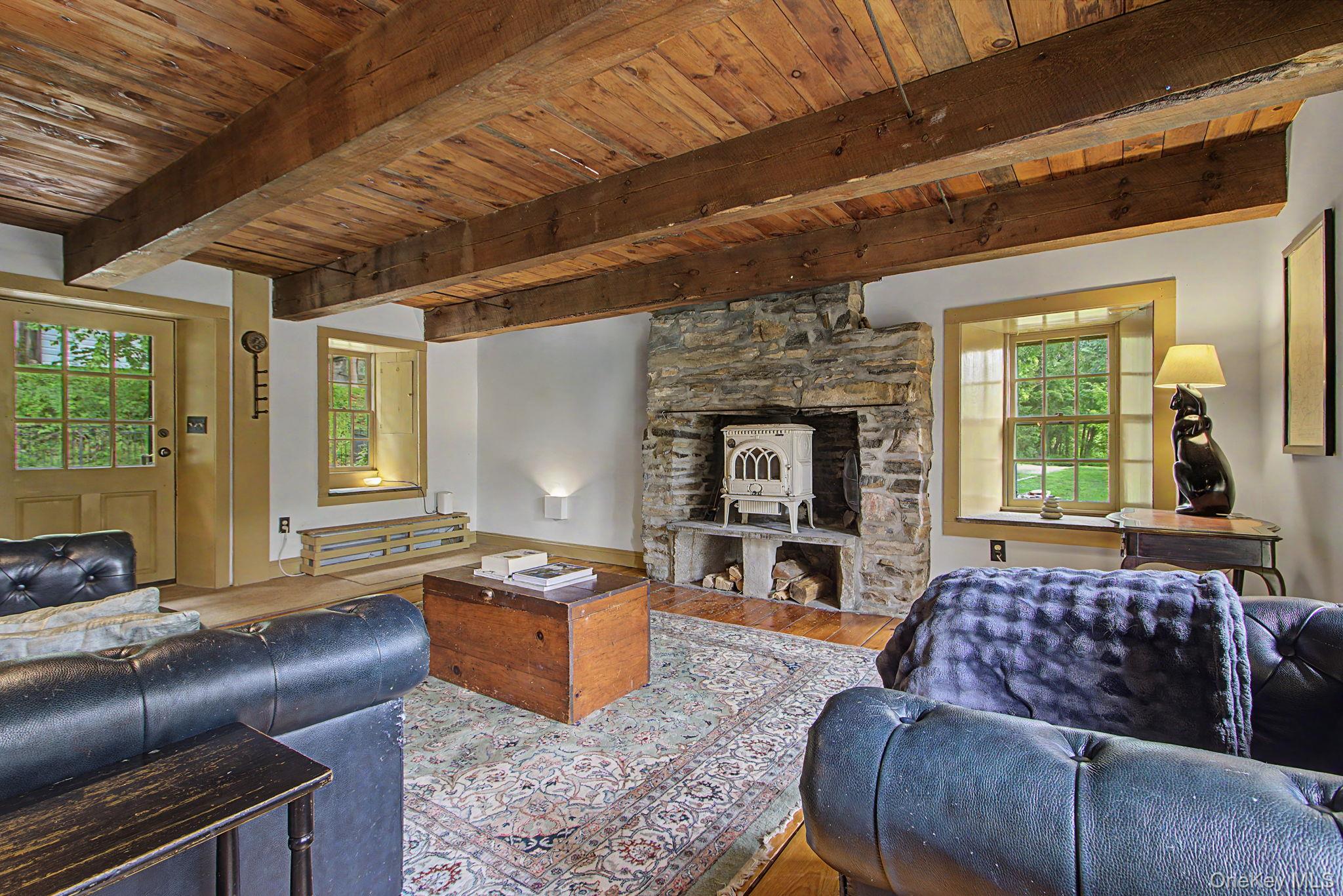 168 Old Rte 55 Pawling, NY 12564 - Photo 4 of 43 a living room with furniture and a fireplace